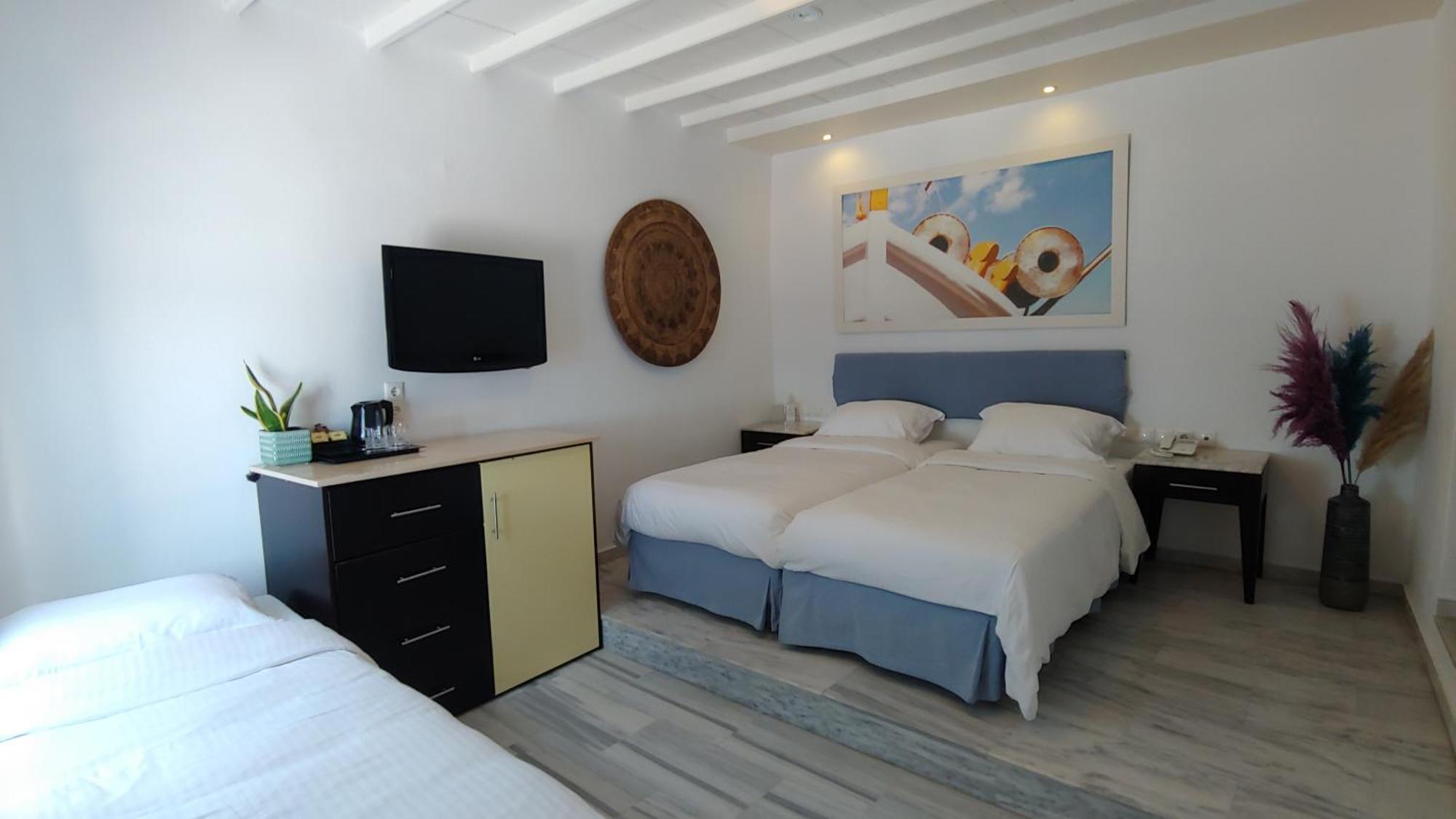 Quarto Triplo Superior com Vista do Mar