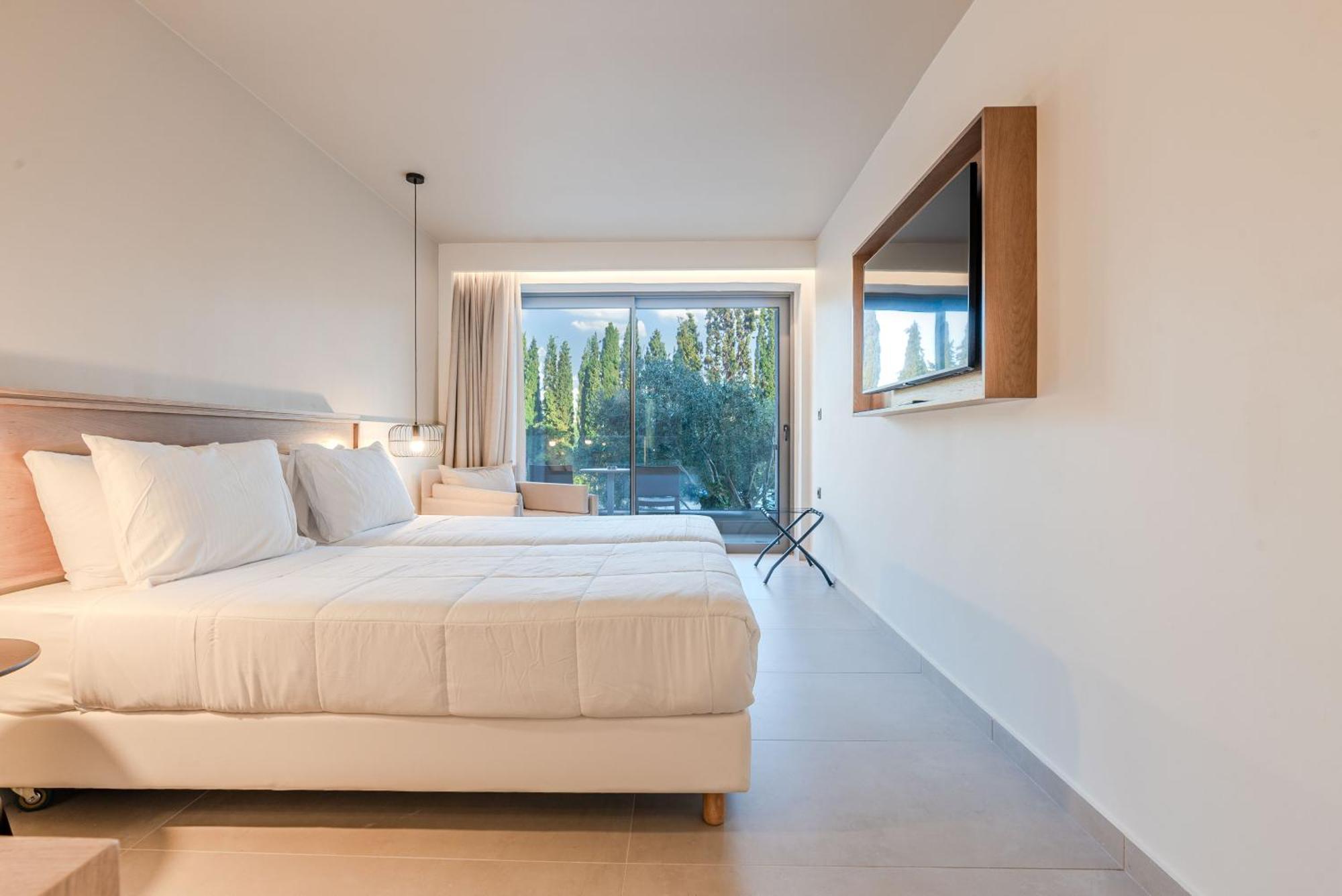 Premium Dreibettzimmer mit Gartenblick