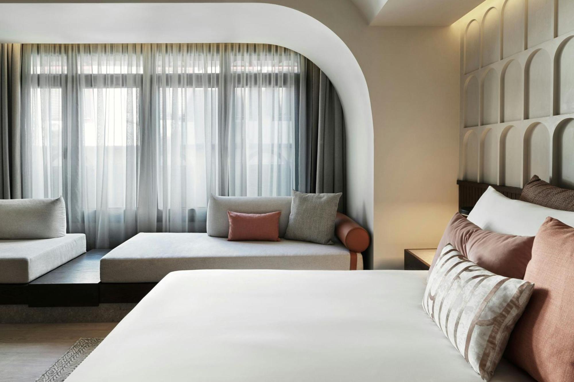 Deluxe King Room with Sofa Bed and City or Urban View