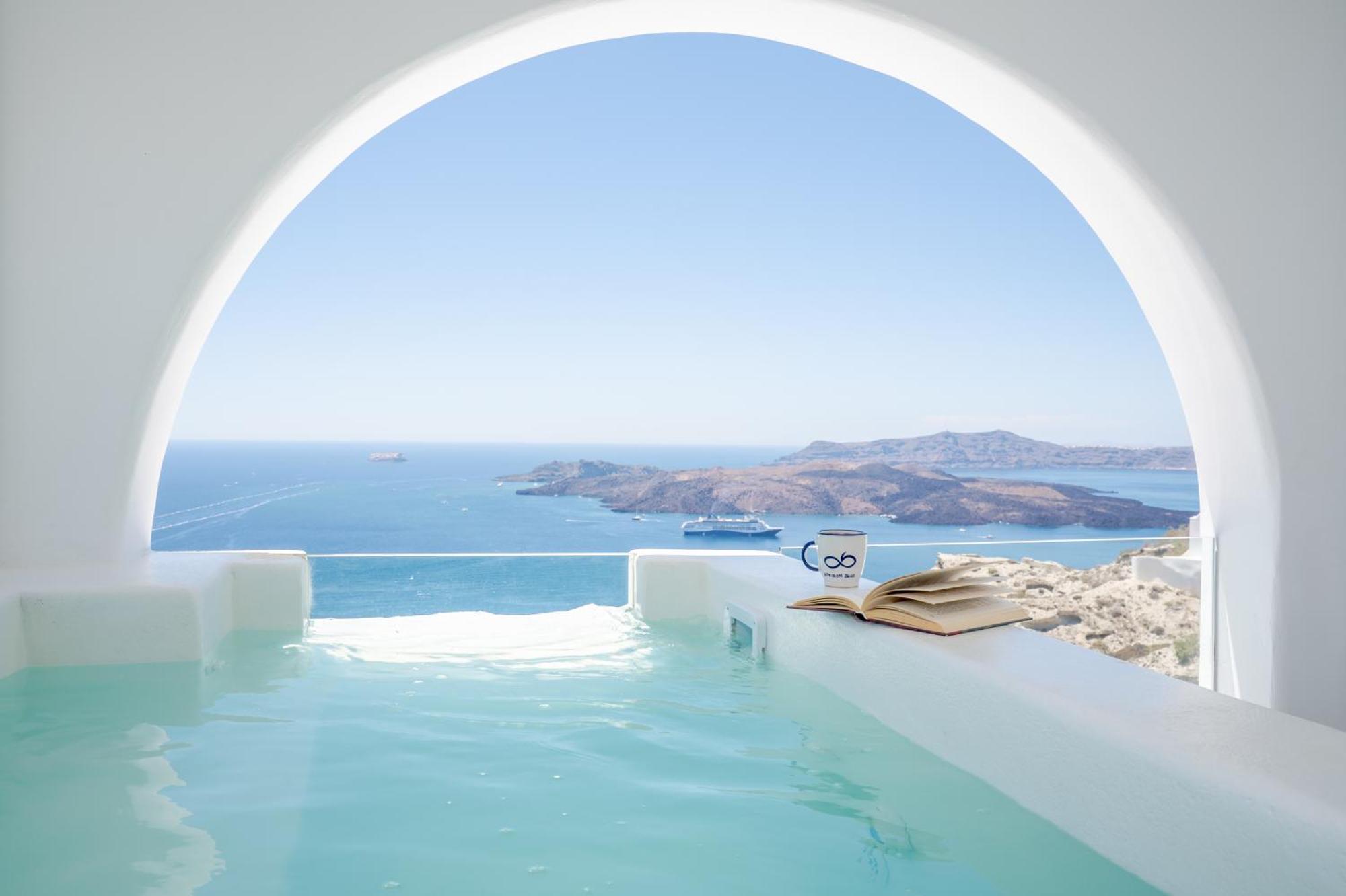 Suite Exécutive Bleue avec Bain à Remous - Vue sur Caldeira