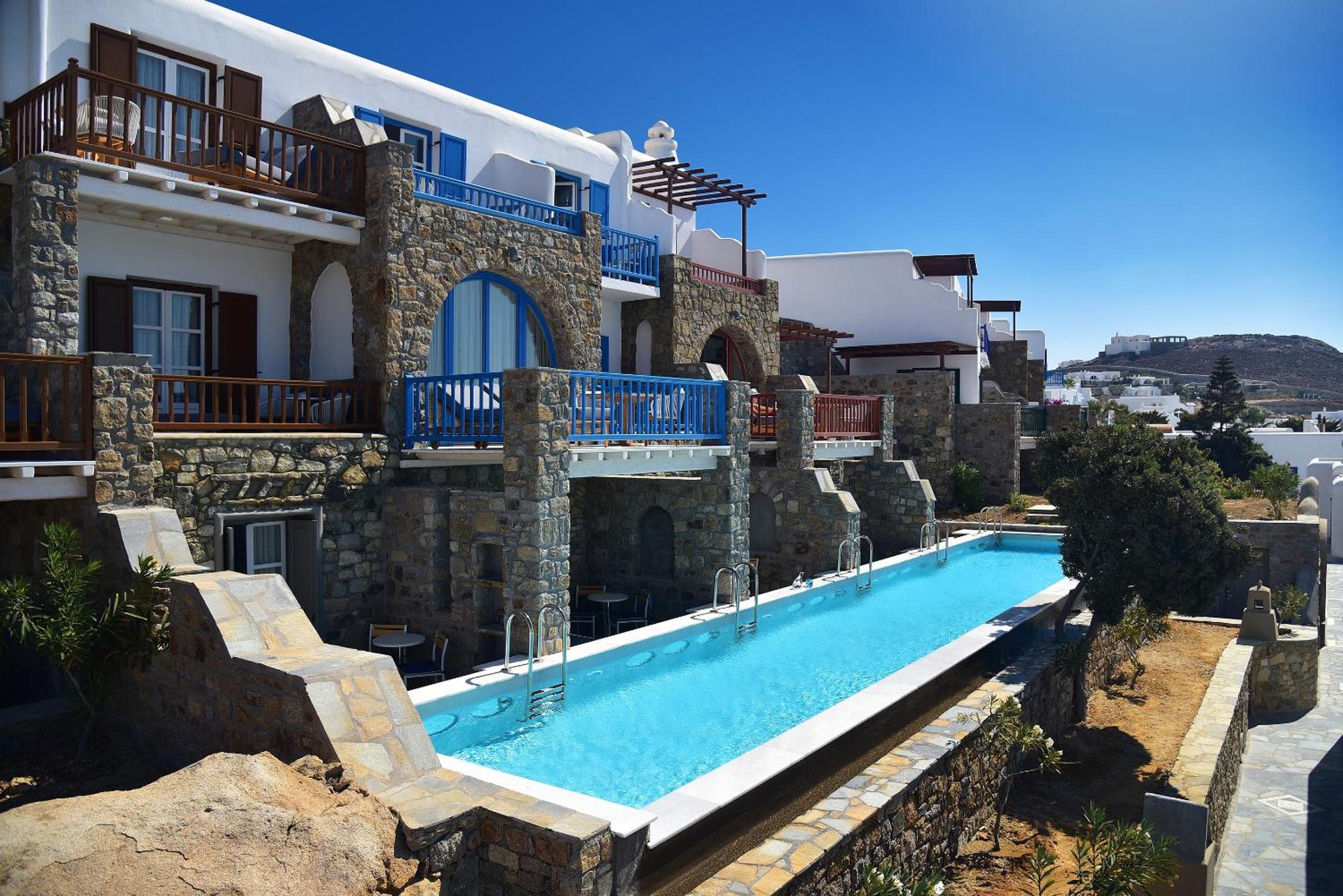 Quarto Premium com Jardim & Piscina Compartilhada